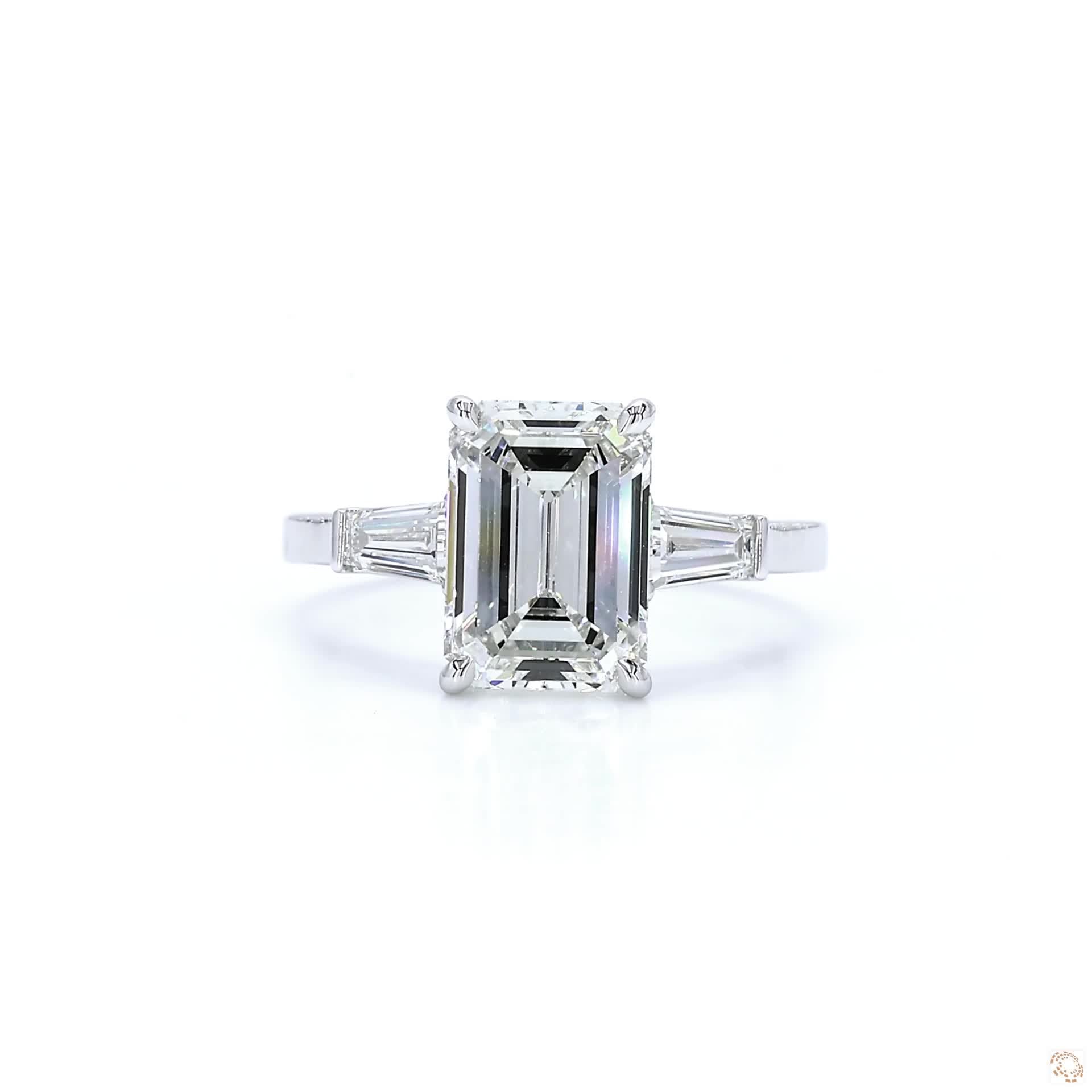 Emerald cut & baguette Three-Stone Engagement Ring