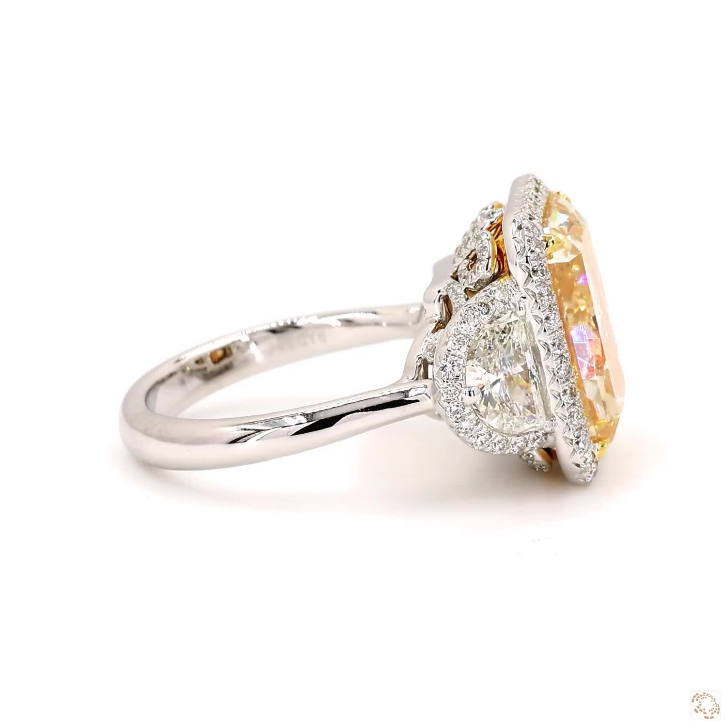 Light Yellow Three-Stone Radiant Diamond Ring