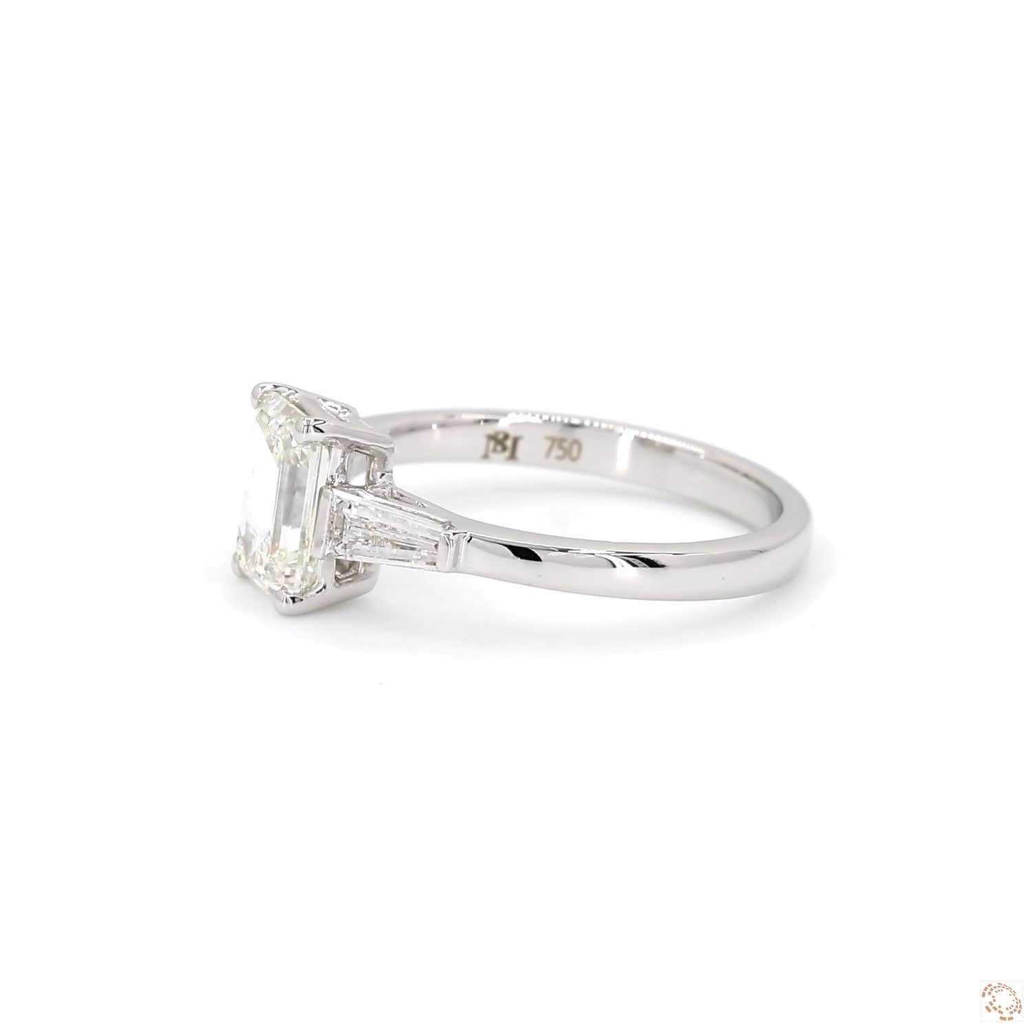 Emerald cut & baguette Three-Stone Engagement Ring