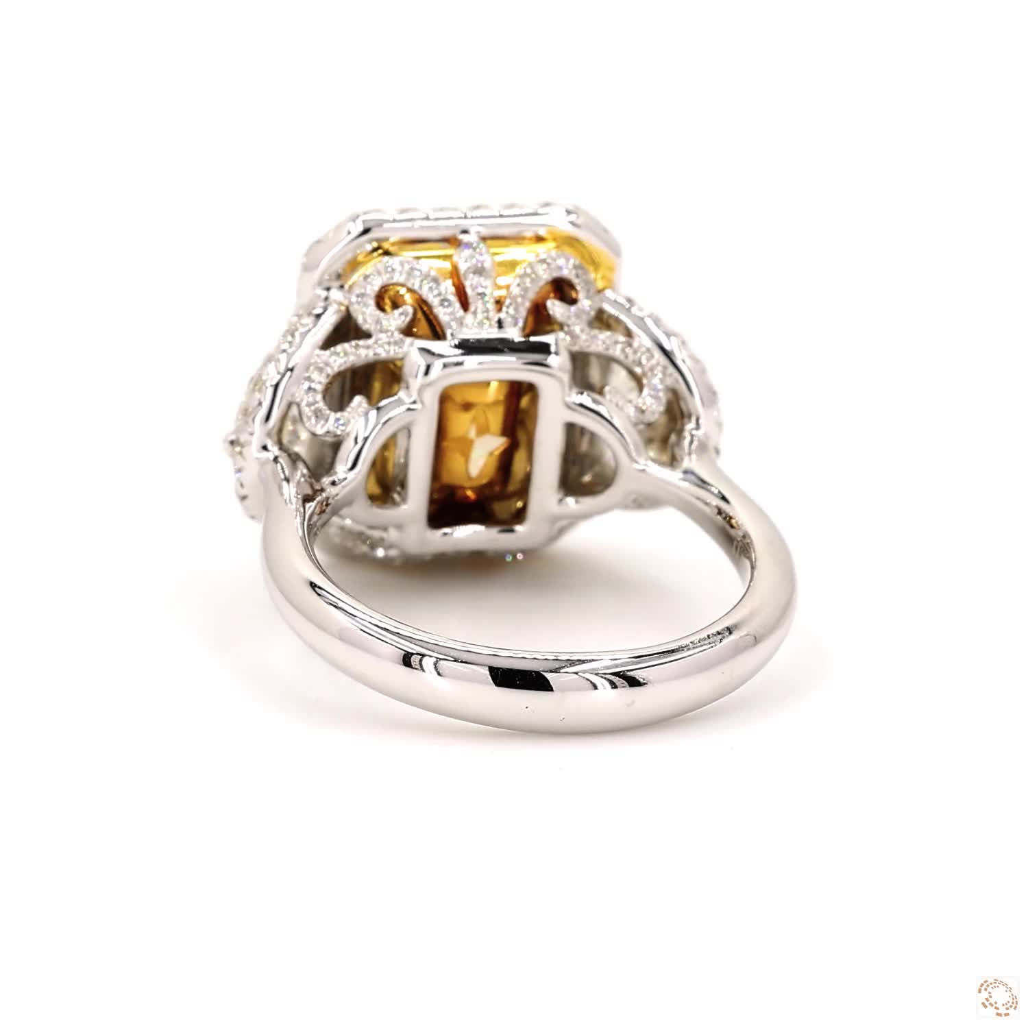 Light Yellow Three-Stone Radiant Diamond Ring