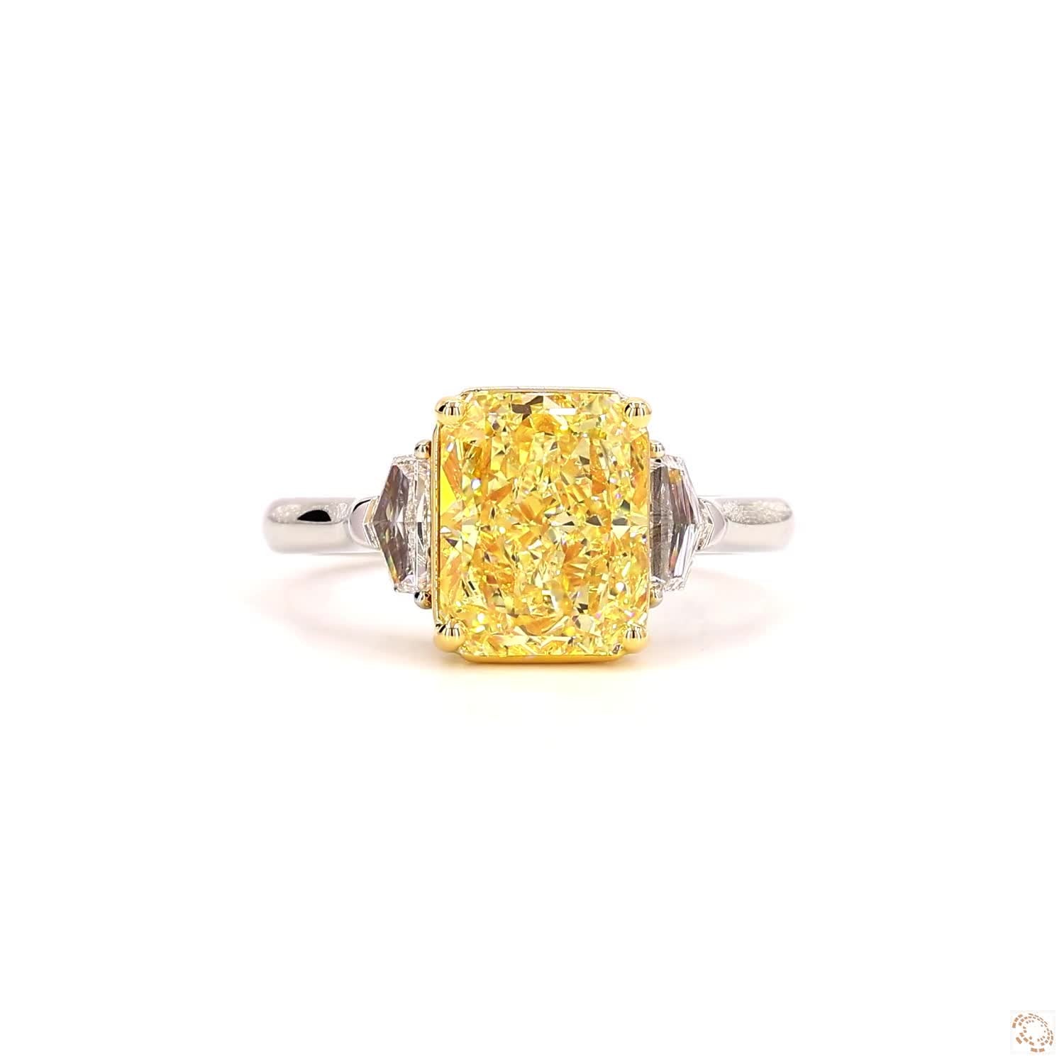 Fancy Yellow Three-Stones Radiant Diamond Ring