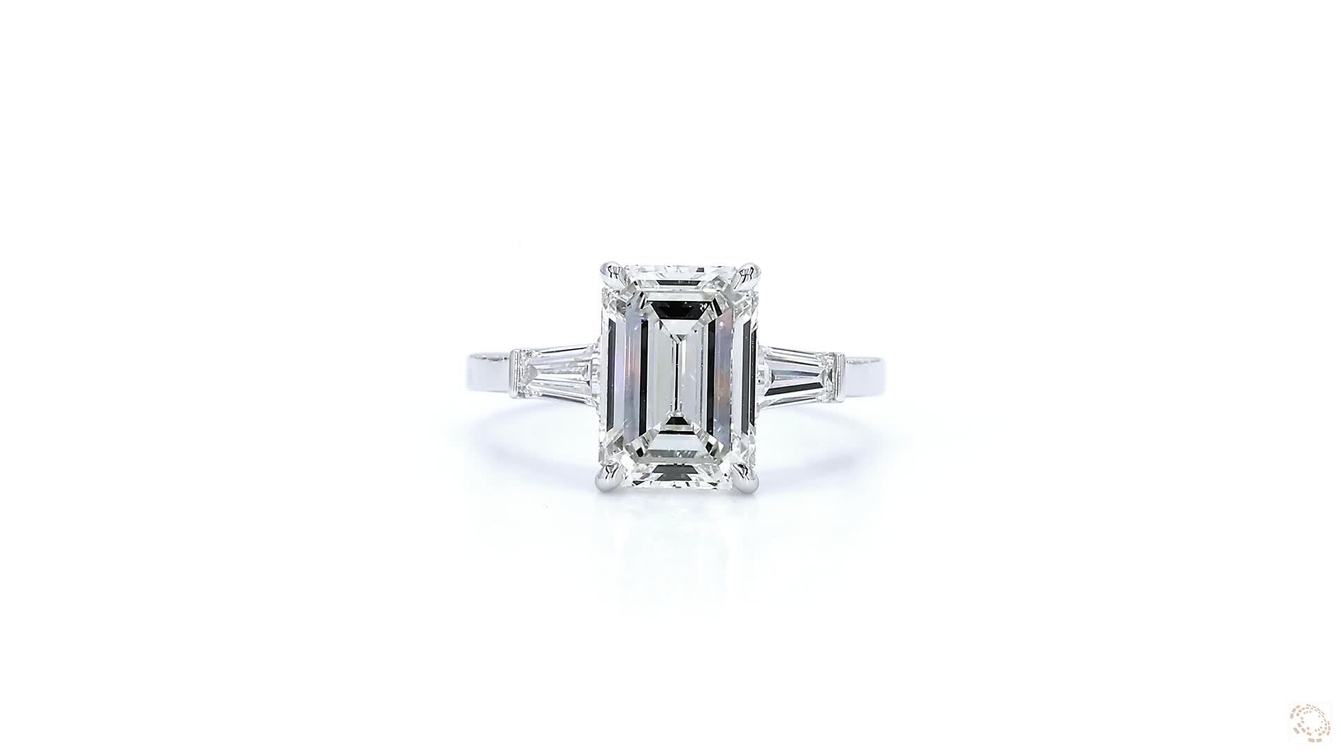 Emerald cut & baguette Three-Stone Engagement Ring