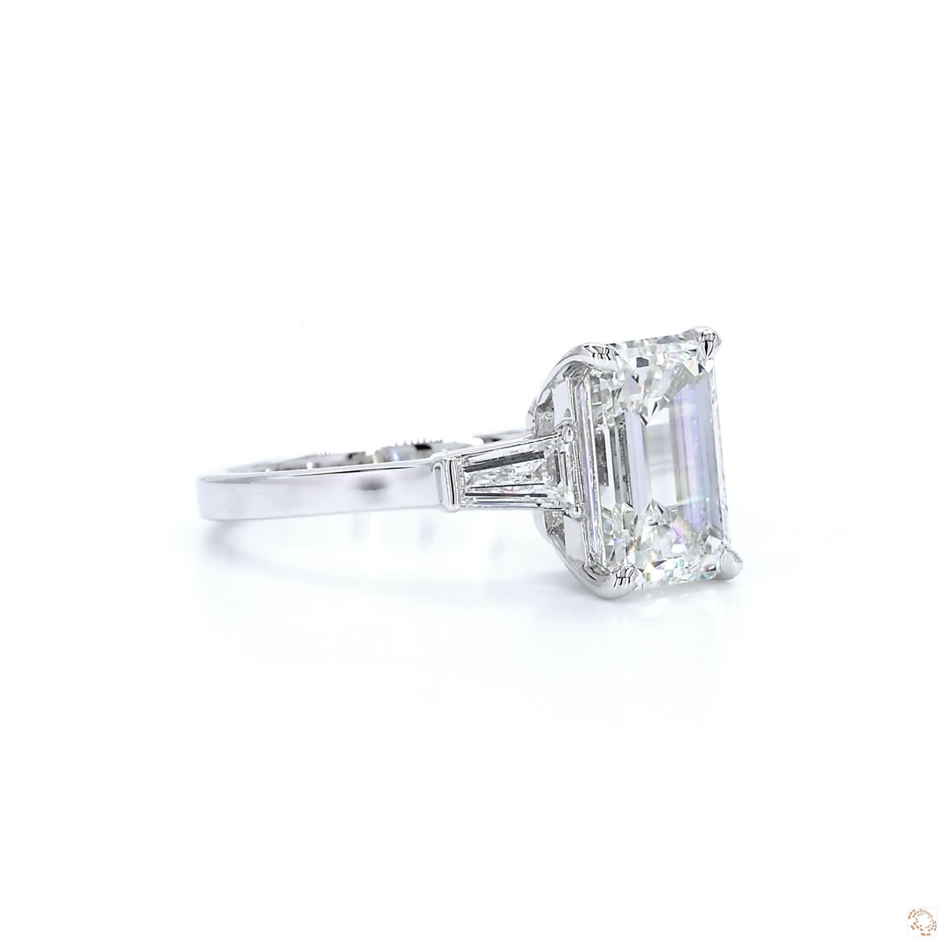 Emerald cut & baguette Three-Stone Engagement Ring
