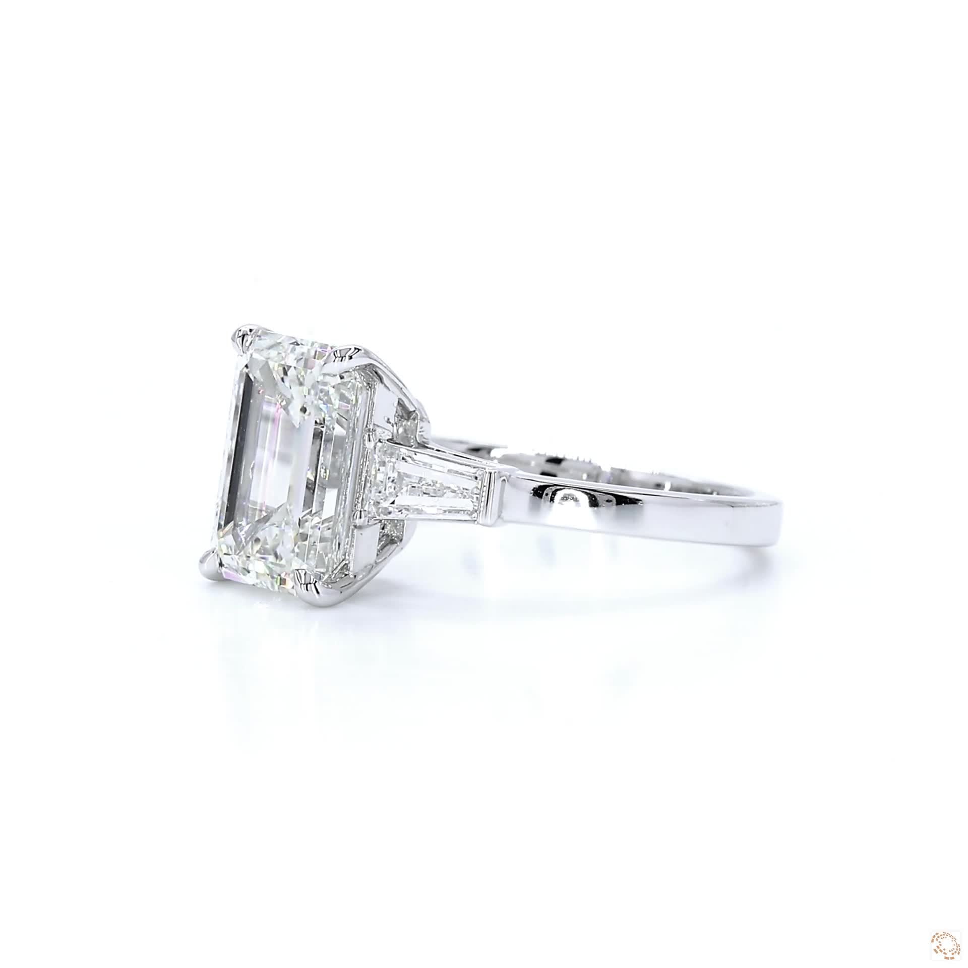 Emerald cut & baguette Three-Stone Engagement Ring