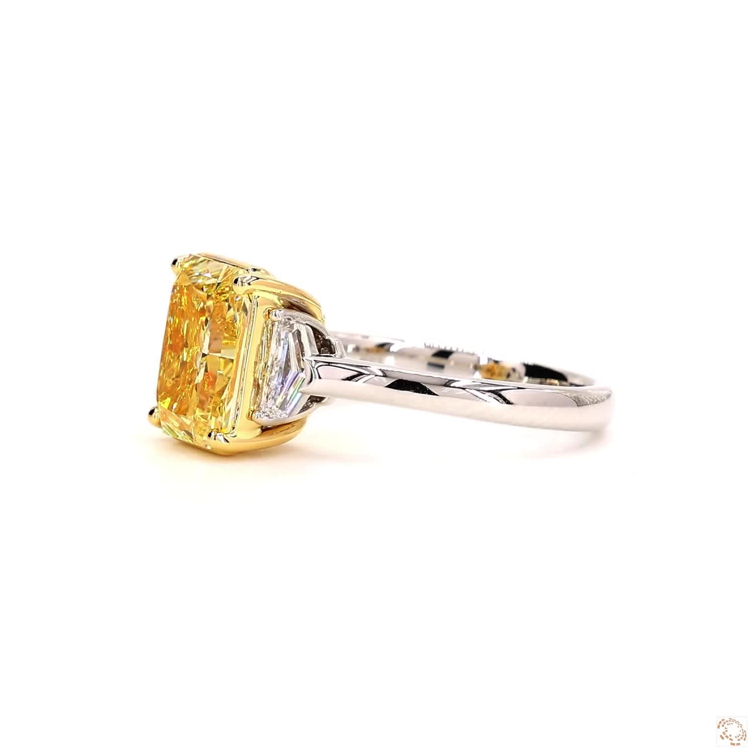 Fancy Yellow Three-Stones Radiant Diamond Ring