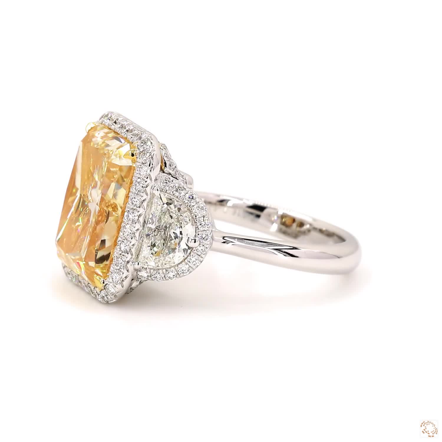 Light Yellow Three-Stone Radiant Diamond Ring