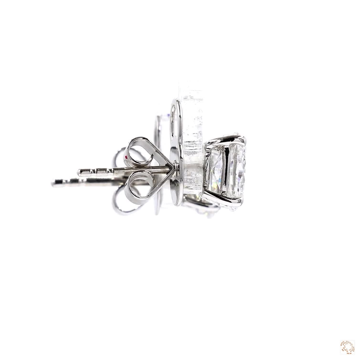 Oval Shape Diamond Stud Earrings in White Gold