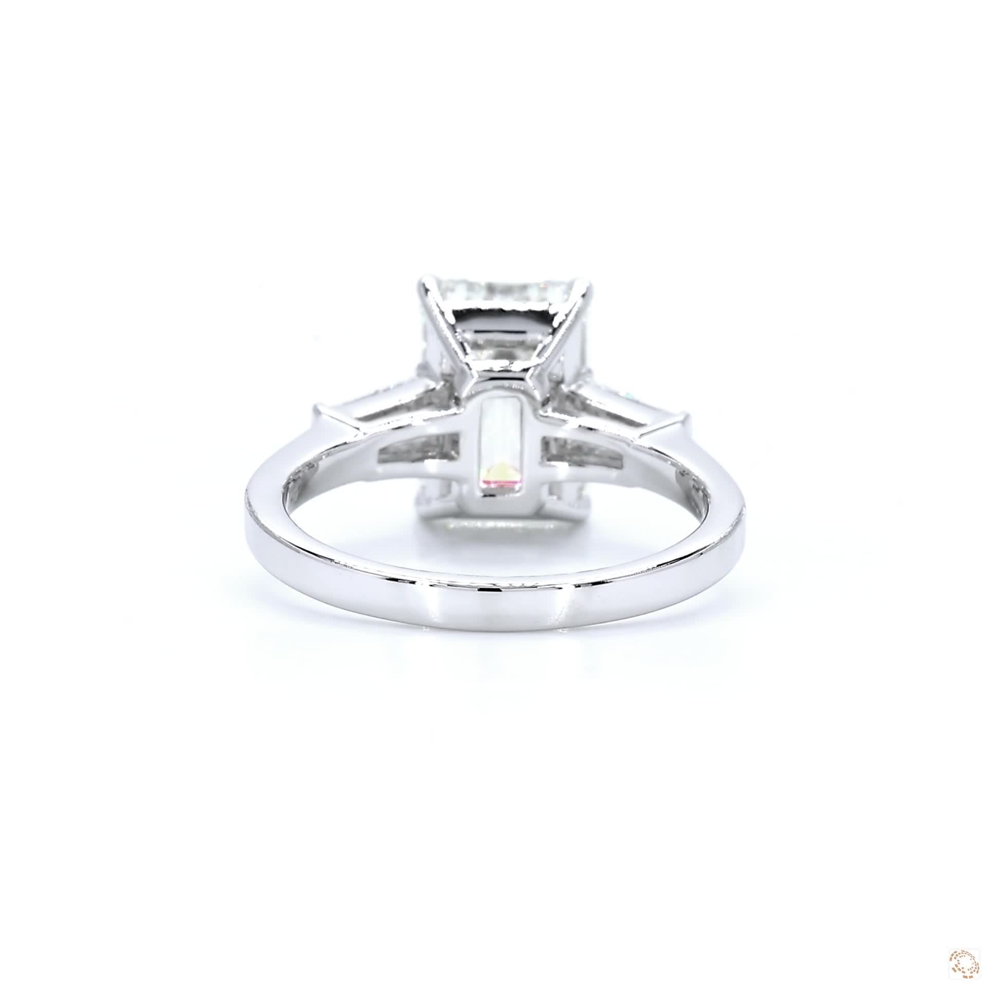 Emerald cut & baguette Three-Stone Engagement Ring