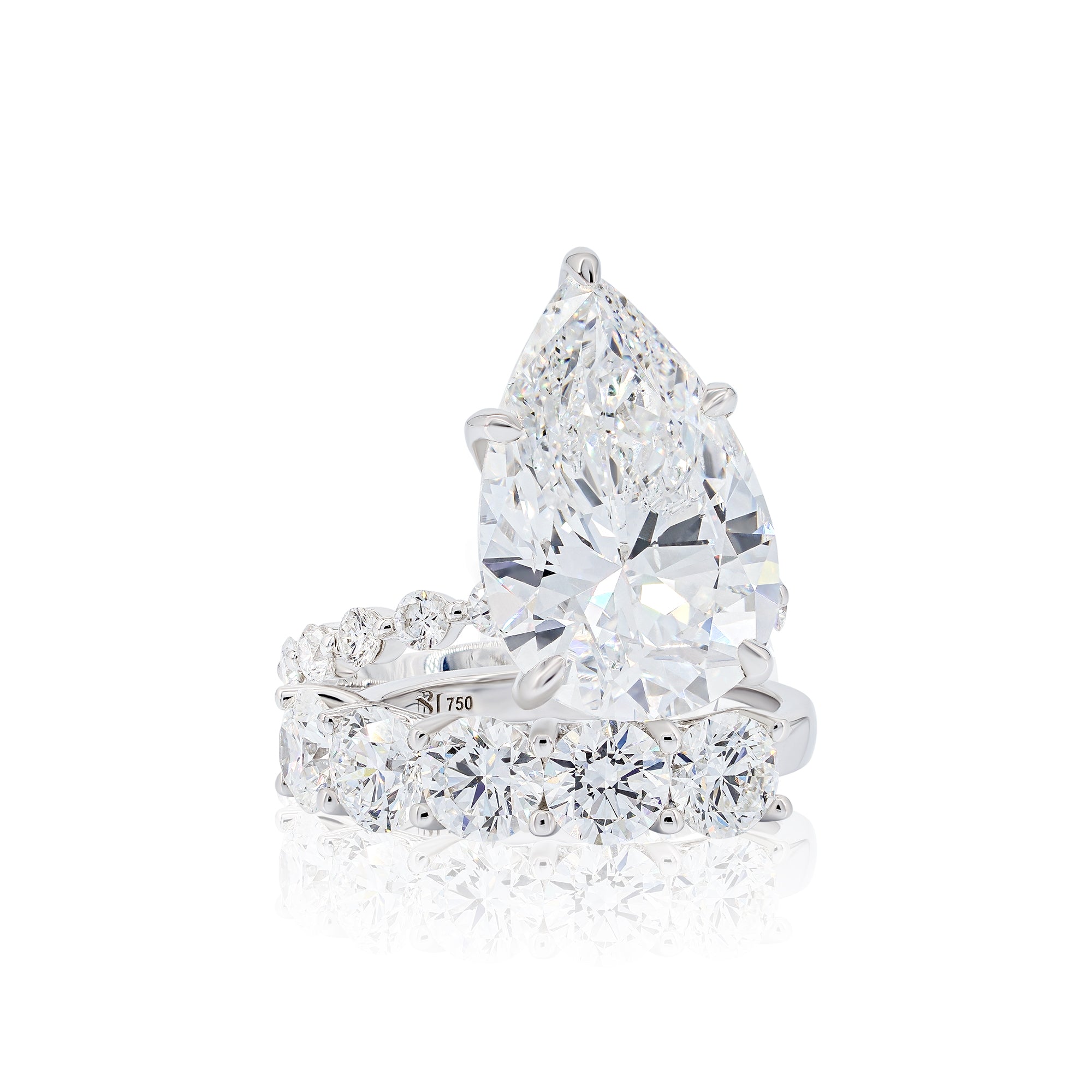 An Exceptional 10 Carat Pear Shape Solitaire Engagement Ring